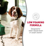 Brown-and-white dog sitting on a rug beside copy promoting low foaming formula for carpet cleaners