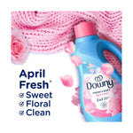 Partial bottle of Downy April Fresh with rose petals and text listing scent attributes: April Fresh, sweet, floral, clean.