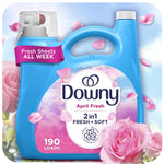 Blue Downy bottle labeled April Fresh 2in1 with pink roses and petals surrounding the packaging