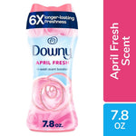 Front view of a Downy April Fresh in-wash scent booster bottle with pink floral graphics and 7.8 oz callout