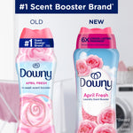 Comparison graphic showing old and new Downy April Fresh in-wash scent booster bottle designs side by side