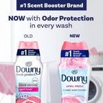 Packaging comparison graphic showing old and new Downy April Fresh scent booster bottles with headline about odor protection.