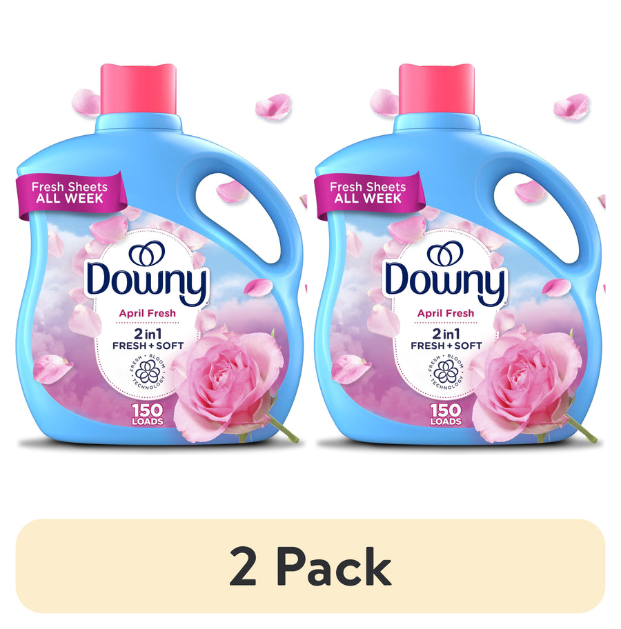 Two blue Downy April Fresh liquid fabric softener bottles with pink caps and rose petals, labeled 2 pack.