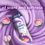 Downy Blends bottle arranged on a purple fabric swirl with text about 2-in-1 scent and peony flowers