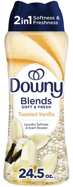 Close-up of a Downy Blends Toasted Vanilla scent booster bottle showing label, vanilla flowers and bead imagery