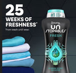 Downy Unstopables Fresh bottle with stacked folded clothes and text '25 weeks of freshness' on dark hex background