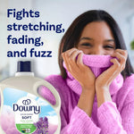 Lifestyle image with smiling woman and Downy bottle alongside text ‘Fights stretching, fading, and fuzz’