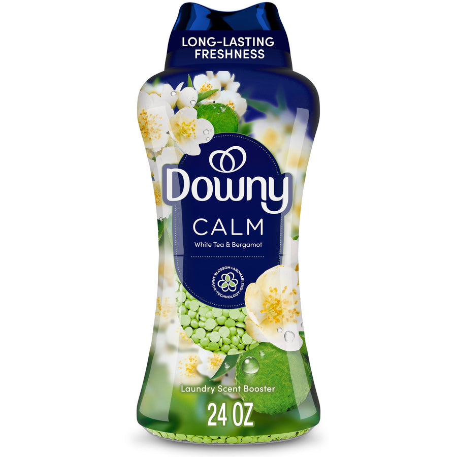 Bottle of Downy Calm laundry scent booster with floral graphics and green fragrance beads visible inside