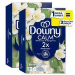 Two overlapping boxes of Downy CALM White Tea & Bergamot mega dryer sheets with floral artwork