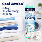 Downy Cool Cotton bottle beside folded laundry and text listing airy, refreshing, clean benefits
