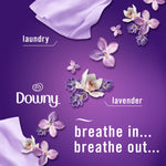Purple promotional graphic with fabric swatches, flowers and Downy branding with the phrase "breathe in... breathe out..."