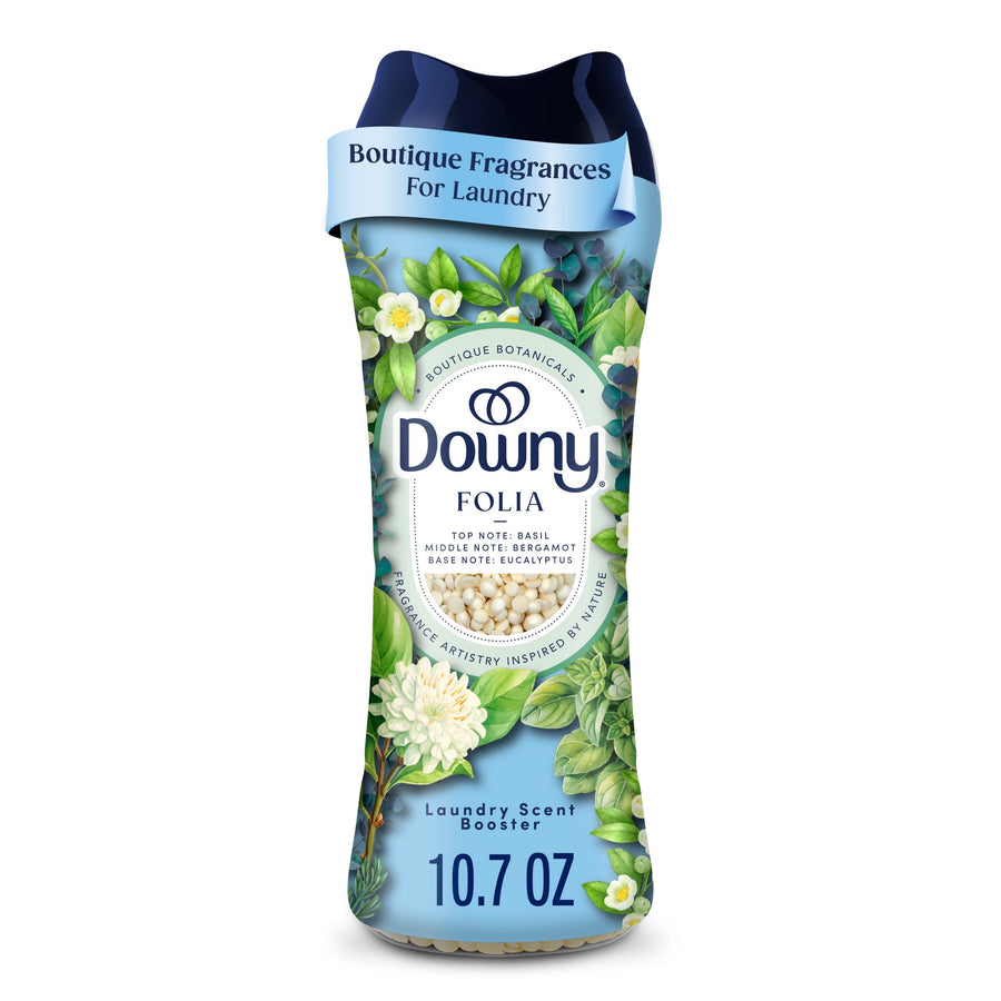 Tall bottle of Downy Boutique Botanicals Folia laundry scent booster with botanical label and 10.7 oz text