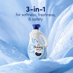 Downy Gentle Ocean Mist bottle on a soft blue background with headline text ‘3-in-1 for softness, freshness, & safety’.