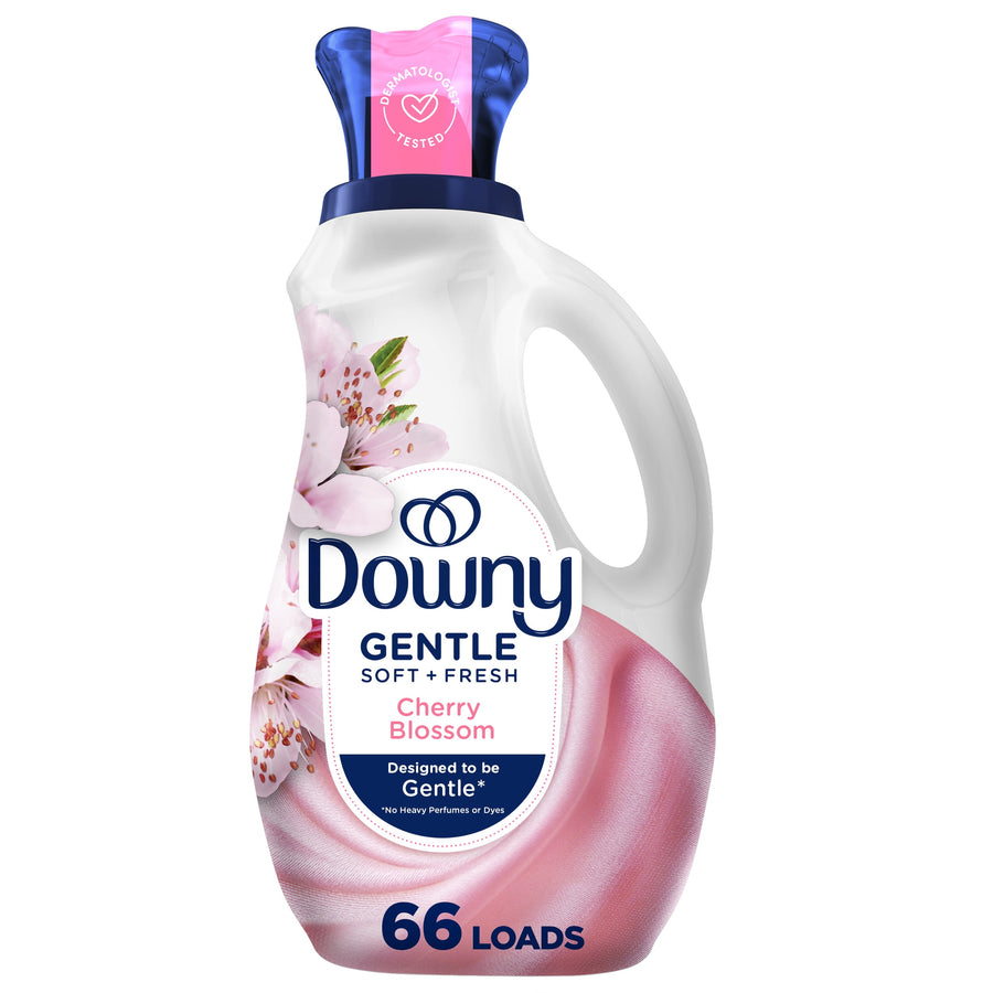 Bottle of Downy Gentle Soft + Fresh Cherry Blossom liquid fabric softener with pink label and blue cap