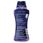 Rear view of Downy Infusions Calm bottle showing usage instructions, ingredient panel and multilingual text