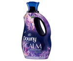 Angled full-product shot of a purple Downy Infusions Calm fabric softener bottle with floral artwork