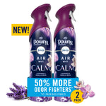 Two Downy Infusions Febreze Air Mist Calm spray bottles with lavender imagery and a 50% more odor fighters banner