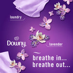 Purple lifestyle/infographic panel with lavender flowers, fabric swatch and the Downy logo with text breathe in... breathe out...
