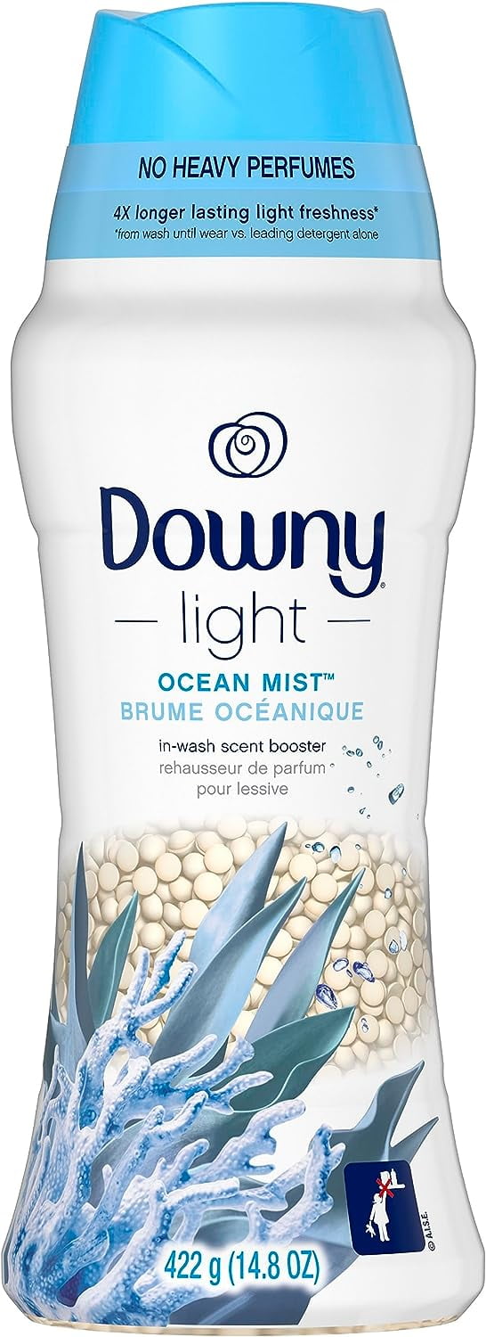Tall white Downy Light Ocean Mist in-wash scent booster bottle with blue cap and bead illustration