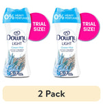 Two Downy Light Ocean Mist scent booster bottles labeled 0% heavy perfumes with pink ‘trial size’ badges and “5.7 oz.” callouts.