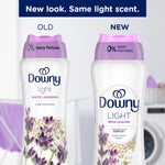 Side-by-side comparison graphic showing old and new Downy Light White Lavender bottle designs with lavender imagery