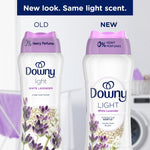 Graphic comparing old and new Downy Light White Lavender bottle designs with headline “New look. Same light scent.”