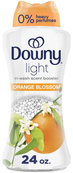 Front view of a Downy Light Orange Blossom in-wash scent booster bottle showing logo, orange graphic and 24 oz label.