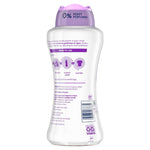 Back view of a Downy Light White Lavender bottle showing usage icons, ingredients text and barcode on white background.