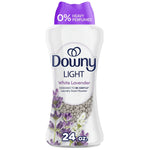 Close-up front product shot of Downy Light White Lavender bottle with purple cap, brand logo and visible scent beads.