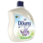 Angled view of a Downy Nature Inspired honey lavender fabric conditioner jug with handle and cap