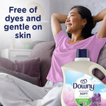 Relaxed woman on a couch with a Downy Nature Inspired honey lavender bottle and text ‘Free of dyes and gentle on skin’