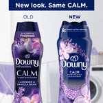 Comparison graphic showing old versus new Downy Calm bottle designs with product branding and floral imagery