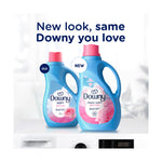 Comparison image of old and new Downy bottles with headline 'New look, same Downy you love' on a laundry room surface