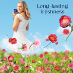Woman in a white dress holding a Downy Peonia bottle with floating flowers and ‘Long-lasting freshness’ text
