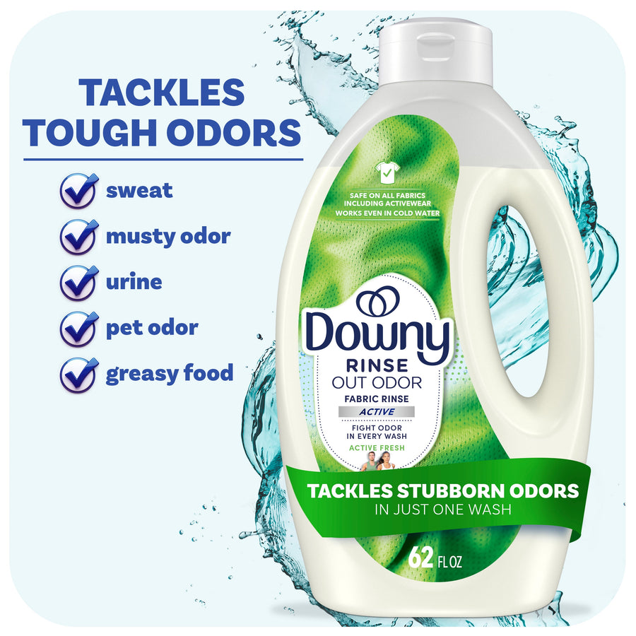 Bottle of Downy Rinse Out Odor fabric rinse with green label and callouts about tackling tough odors