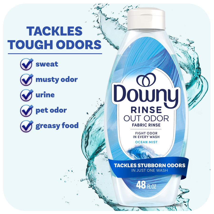 Bottle of Downy Rinse Out Odor fabric rinse in ocean mist scent with water splash and odor checklist.