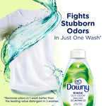Promotional image showing a white T-shirt and splash of water beside a Downy Rinse Out Odor bottle and claim about fighting stubborn odors