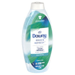 Slightly angled studio image of a Downy Rinse & Refresh Cool Cotton bottle displaying front label and cap.