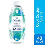 Clear bottle of Downy Rinse & Refresh Cool Cotton fabric rinse with blue-green label and 48 fl oz marking