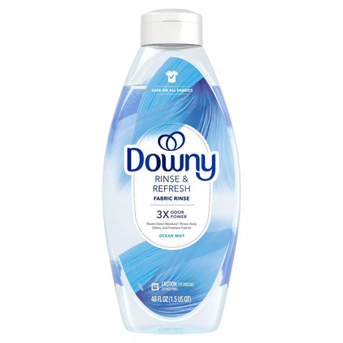 Clear plastic bottle of Downy Rinse & Refresh fabric rinse in Ocean Mist scent with blue label artwork