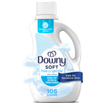 White Downy Soft Free & Gentle fabric softener bottle with blue label and cloud graphics, front view.
