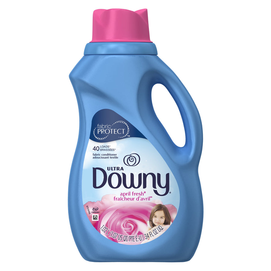 Blue bottle of Ultra Downy April Fresh liquid fabric conditioner with pink cap and rose graphic on label