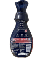 Rear view of a Downy Ultra Soft + Fresh Bliss fabric softener bottle showing label and usage info
