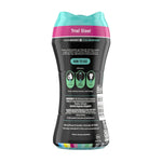 Rear view of a Downy Unstopables trial-size bottle showing usage icons, ingredients block, and barcode
