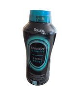 Black Downy Unstopables bottle with teal cap and 'Squeeze & Sniff! Fresh Boost' label on white background