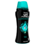 Angled front view of Downy Unstopables Fresh bottle with teal cap and droplet imagery on black bottle