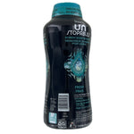 Angled rear view of a black Downy Unstopables Fresh in-wash scent booster bottle with teal cap and barcode