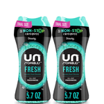 Two trial-size Downy Unstopables Fresh laundry scent booster bottles shown side by side with teal accents and 5.7 oz label