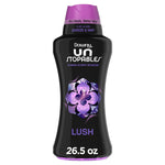 Black bottle of Downy Unstopables Lush in-wash scent booster with purple cap and floral logo