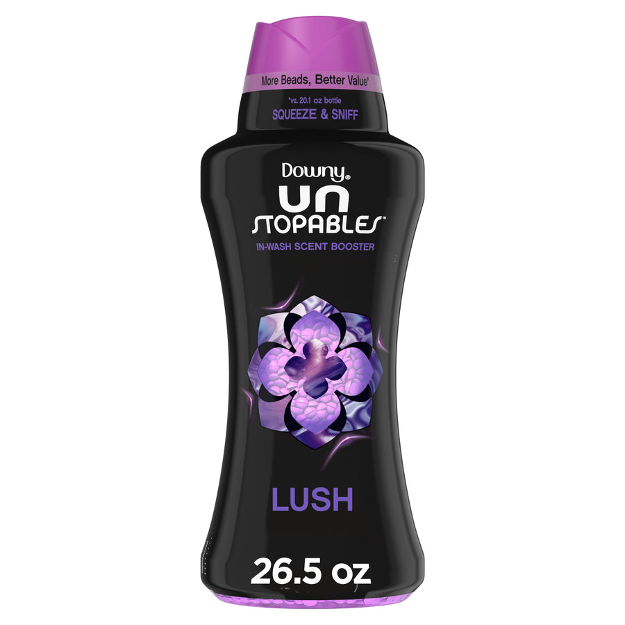 Black bottle of Downy Unstopables Lush in-wash scent booster with purple cap and floral logo